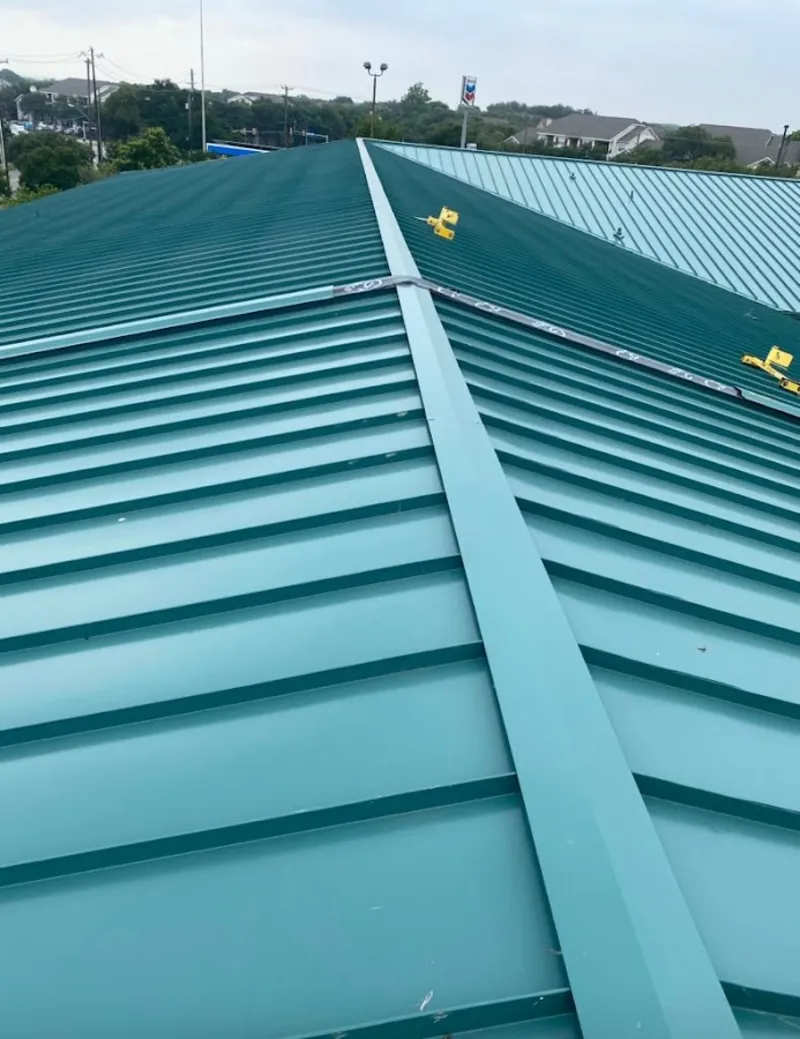 Green commercial metal roof ridge and valley for Metal Roof Repair in Holly Springs